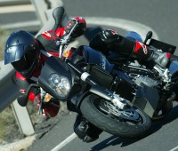 Taking a corner on the 2005 KTM Superduke.