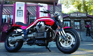 High-tech single-sided swingarm and male-slider fork are joined by double-cradle, tube-steel frame.