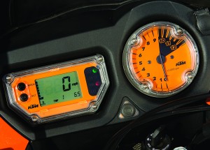 RQ5M7854 Sparse instrumentation offers a digital speedo and analog tach. The button, low and between them, turns ABS on and off.