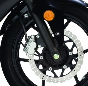 FrontWheel Like the rear, the front petal-style rotor is gripped by a two-piston caliper.