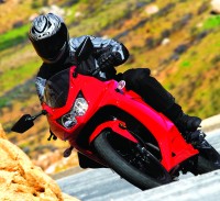 Kawasaki gave the liquid-cooled, 249cc, DOHC parallel twin new heads with reshaped intake and exhaust ports, and more compact combustion chambers, all in the interest of enhanced midrange.