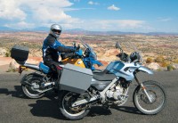 Bikes at an overlook with the Henry Mountains in the distance.