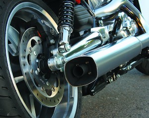 375O6177 Rear suspension bottoms out easily. Satin chrome exhausts complete dragster look, but can melt fabric behind the taper.