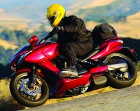 Honda’s “Crossover” DN-01 blends the easy fun of a scooter with the lowness of a cruiser and handling of a sport machine.