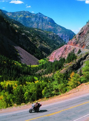 Riding through one of the many valley backdrops in the Colorado Rocky Mountain High Country.