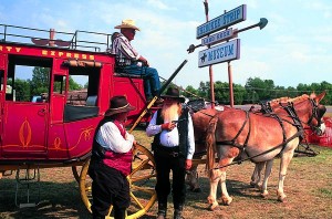 Kansas_9 Living History reenactors at the Land Rush Museum in Arkansas City offer visitors a stage ride— at gunpoint if need be.
