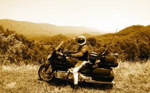 The area surrounding Snake Mountain is heavily wooded, and the camera is looking out over the Appalachian Mountains toward the Cherokee National Forest.