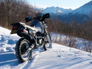 Mark Haldane’s KLR650 on Arctic Road with the Chugach Mountains in the background.