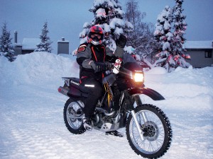 Mark Haldane in front of his neighbor’s house in the snow.