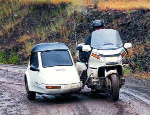 web-Sidecars_4 A third wheel can be very useful on a wet dirt road; this car is a Champion Daytona 2+2.