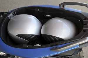 BMW-C-600-Sport-underseat Sport's underseat storage holds two full-face helmet with the Flex Case deployed.