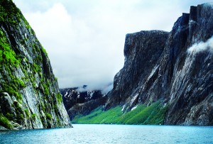 IMG_0968 Western Brook Pond is a fjord once connected to the ocean. Its 2,000- foot-high cliffs rise out of this freshwater lake. This gem of Newfoundland is a World Heritage Site and is reached after a 45-minute hike to a government-run boat service.