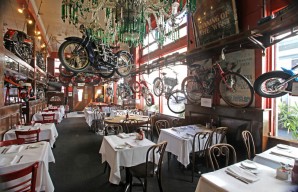 The motorcycles hanging from the ceiling as adornments in the famous San Francisco bar and grill Eddie Rickenbacker?s will be auctioned in August 2012.