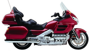 web-HONDA GL1800 RED The new Honda Gold Wing is actually priced lower, and reportedly weighs less, than the 2000 SE model. At its heart is a revised 1,832cc opposed flat six with fuel injection said to be capable of 118 horsepower and 125 pounds-feet of torque at the crankshaft.