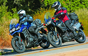 Despite comparable seat heights, the rider sits down in the Triumph but up on top of the Yamaha. Both have 19-inch front and 17-inch rear wheels.