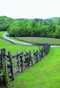 web-Blue_Ridge_C11 This defining style of roadway running atop mountain ridges, alongside split rail fences, through open meadows is common on middle portions of the Parkway.