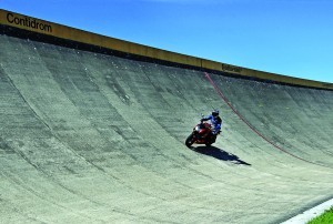 The high banking track allowed the press to test the limits of the tires during high-speed cornering.