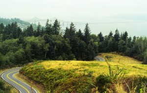 web-LEWIS_13 The view from the base of the Astoria Column. The four-milelong bridge in the background connects Oregon and Washington. The ride up the twisty road to the Column is half the fun.