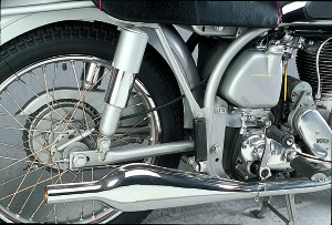 web-collector_G The rear half of the Featherbed frame, with Woodhouse Monroe shocks and a muffler from the twin of the same era.