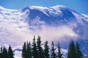 Mt.Rain_10_FPO The view from Sunrise Visitors Center (elevation 6,400 feet), visited by thousands daily. With snow whipping the air at 70 mph, only serious mountaineers will consider going anywhere near Rainier’s summit.