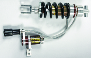 web-IMG_8927 Top-line custom G3-S remote-reservoir shock has all the adjustability features: high- and low-speed compression damping; rebound damping; and hydraulic preload adjuster.