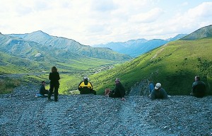 web-Alaska_10 Two-wheel explorers enjoying a picnic with perfect scenery near the Continental Divide on Atigun Pass.