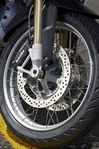BMW R 1200 GS front wheel Dual, opposed, radial-mount 4-piston calipers squeeze 305mm discs. Semi-integral ABS is now standard and offers multiple modes. Cross-spoke wheels are optional.