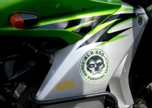 The Kawasaki KLR650, bearing the “zombie survival vehicle” identification sticker, is an example of the kind of motorcycle equipped for response in rural areas where all-terrain capability is critical.