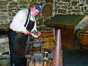 Blacksmith interpreter at Fort Larned, Kansas. This is the most perfectly restored fort along the Trail. web-DSC02711