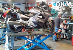 Wouldn’t it be nice to have that lift for tire changes at home? The automatic tire machine and the electronic spin balancer would be nice, too!