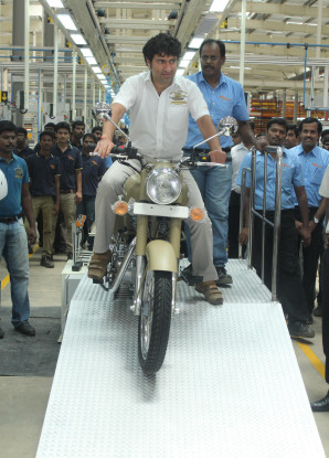 Mr. Siddhartha Lal, MD & CEO Eicher Motors Ltd. rolling out the first bike, the Royal Enfield Desert Storm, from the new Oragadam Plant.