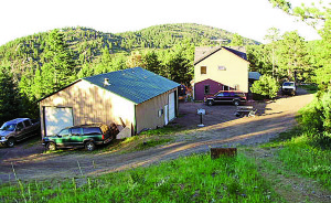 Jim and Jeannie Key’s house and shop before it was destroyed in the High Park Fire in Colorado in June 2012.