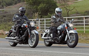 The Kawasaki Vulcan 900 Classic and Honda Shadow Aero have different handlebar shapes and positions, but both have small cockpits.