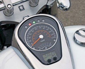 Chrome tanktop console includes a speedometer and LCD displays for fuel, gear position, clock and odometer/dual tripmeter.