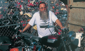 Adler poses with a 1970 Triumph Bonneville. He is most happy when visitors to All-Bikes Antiques Museum find their own path down memory lane.