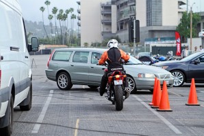 Left-turning car in front of motorcycle nearly causes a crash in mock intersection. (Photo: MIC by Lanae King)