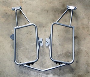 Four mounting points for the Symmetrical Lock-It Carriers stay on the bike; the rest of the rack secures with Dzus fasteners and is easily removed.