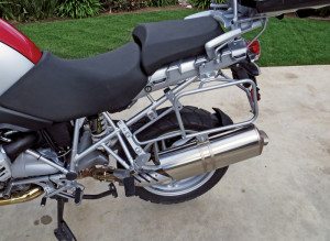 Four mounting points for the Symmetrical Lock-It Carriers stay on the bike; the rest of the rack secures with Dzus fasteners and is easily removed.