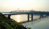 The “Big Muddy” Missouri River flows at a rapid pace, seeking its junction with the Mississippi River just north of St. Louis.