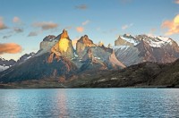 The Cuernos del Paine glow like beacons in the morning sun. The weather is fickle, though—clouds were already gathering as we motored off for our last day of riding.