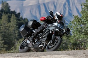 Just nudge the handlebar and the Multistrada leans waaay over. The pegs never touched down, but the centerstand scraped the pavement a few times on the left side.
