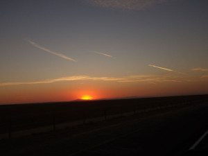 As the sun sets around 7:30pm, I know I'm in the final stretch. I just have to survive the stench of feed lots.