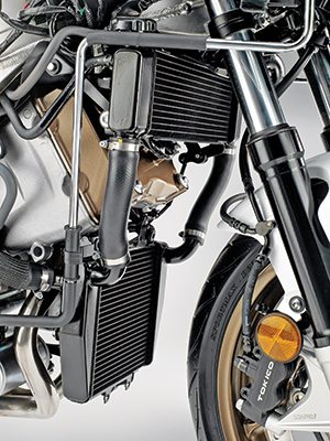 Relocating the twin radiators from each side of the Interceptor to stacked in front allowed Honda to narrow the fairing 1.5 inches.