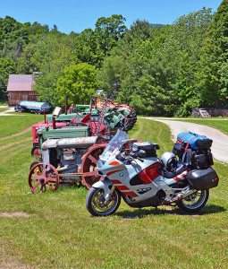 An eclectic collection of antique and vintage farm tractors line the edge of a field at the Dorr Farm on Route 30 just west of Manchester Center.