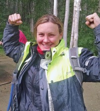 Kate Johnston celebrates gaining a spot in the Iron Butt Association record books.
